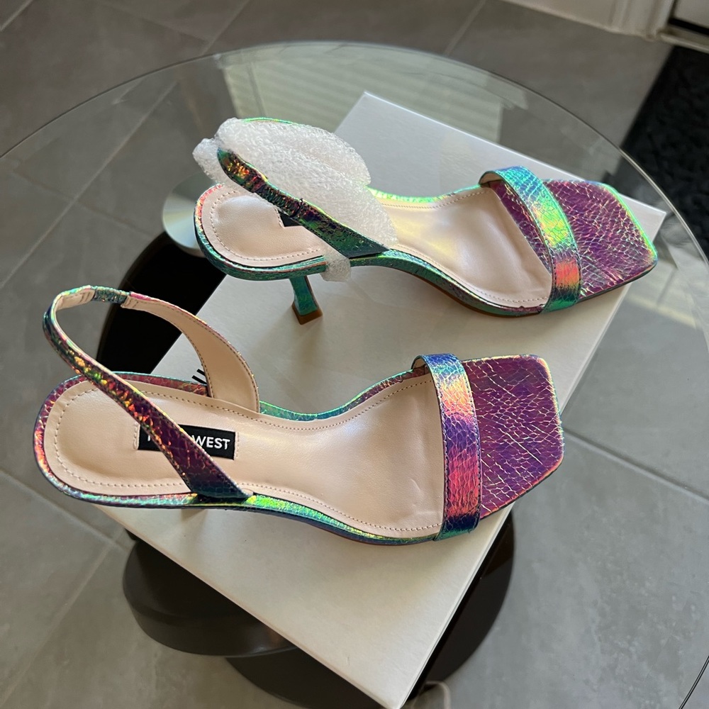 Brand new iridescent purple sling backs from Nine West. Size 8.5M
